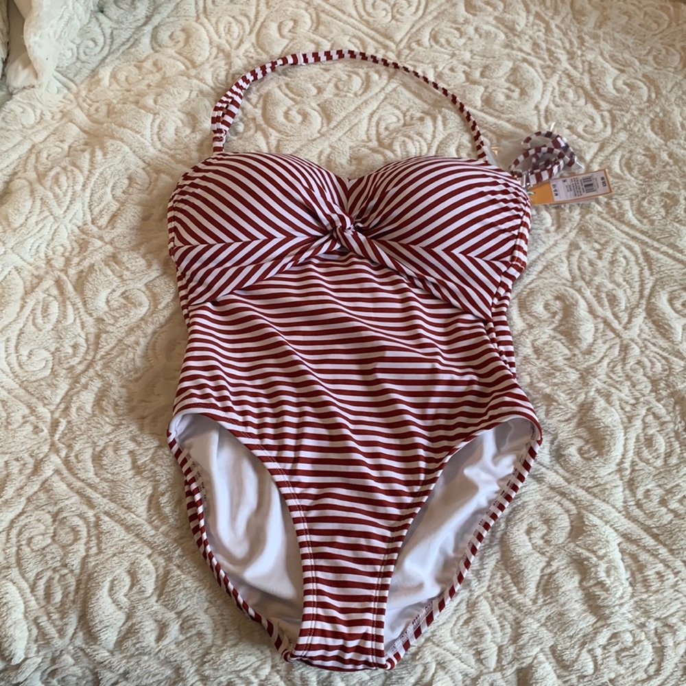 Strapless (with optional straps included) med-coverage, one piece bathing suit